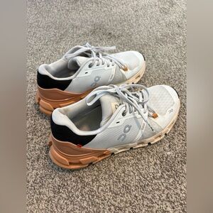 On Running White and Brown Athletic Shoes